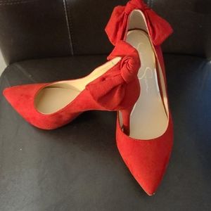 Red heels, never worn